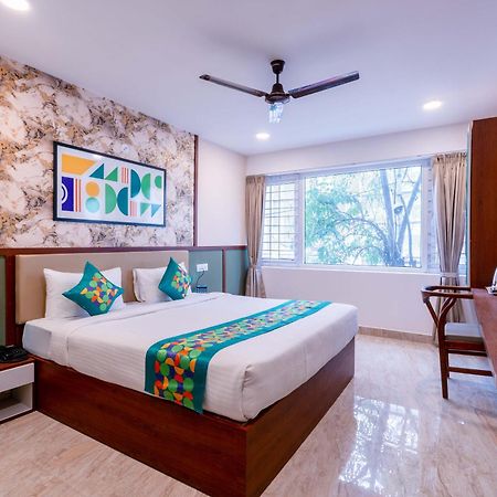 Treebo Emirates Suites Indiranagar Бангалор Экстерьер фото