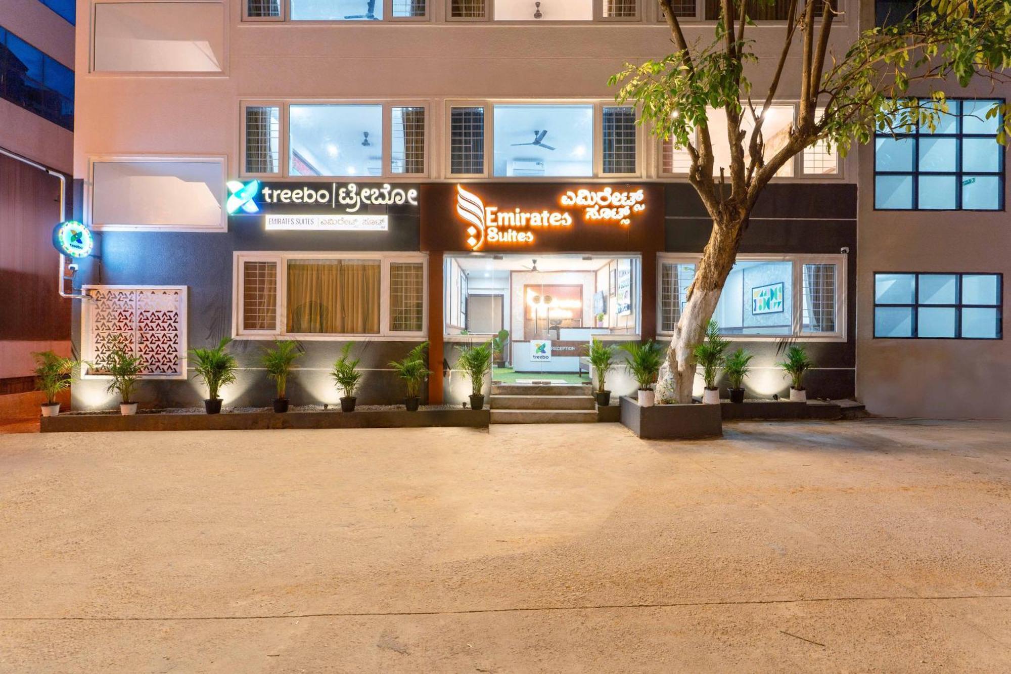 Treebo Emirates Suites Indiranagar Бангалор Экстерьер фото