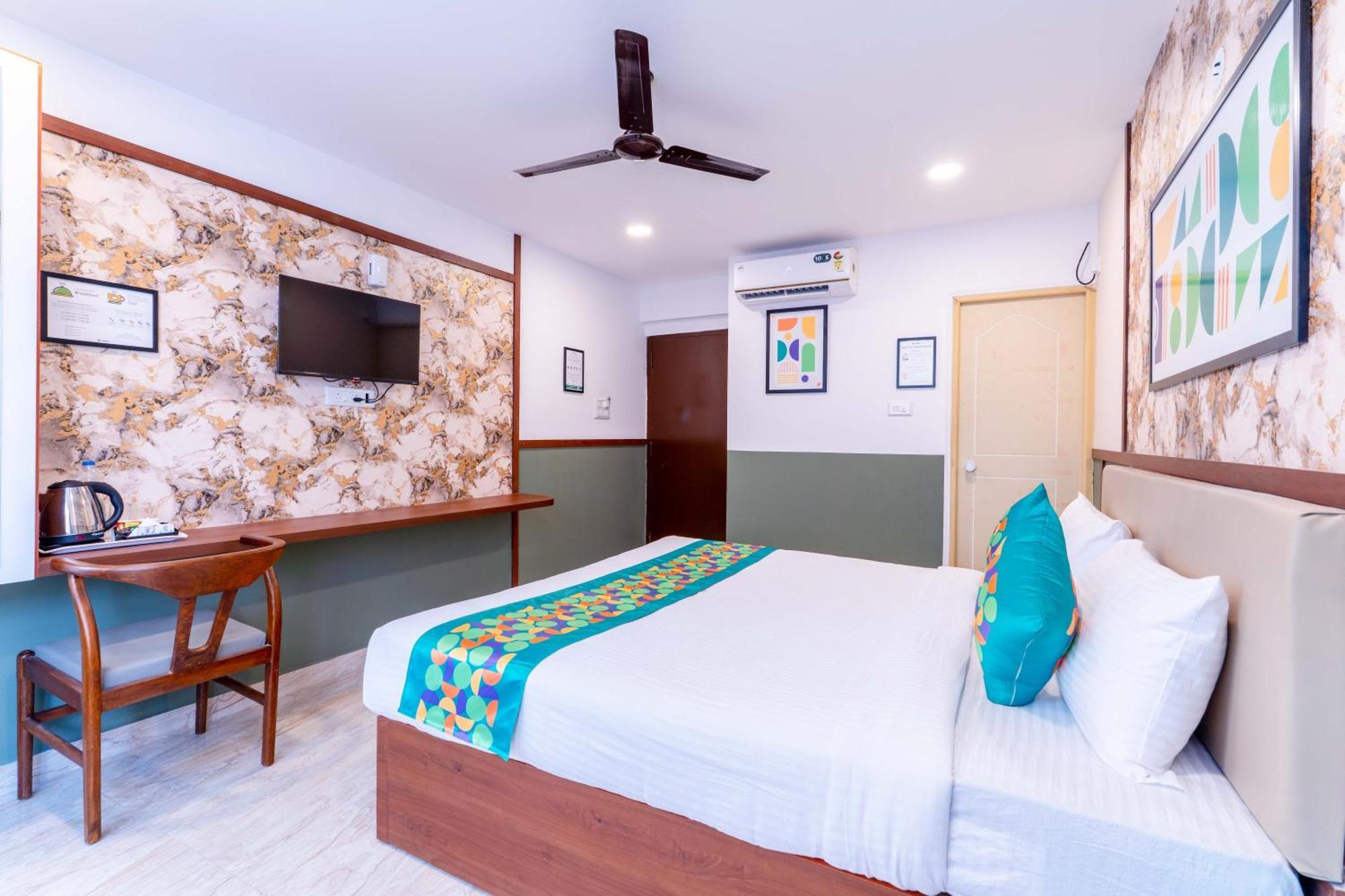 Treebo Emirates Suites Indiranagar Бангалор Экстерьер фото