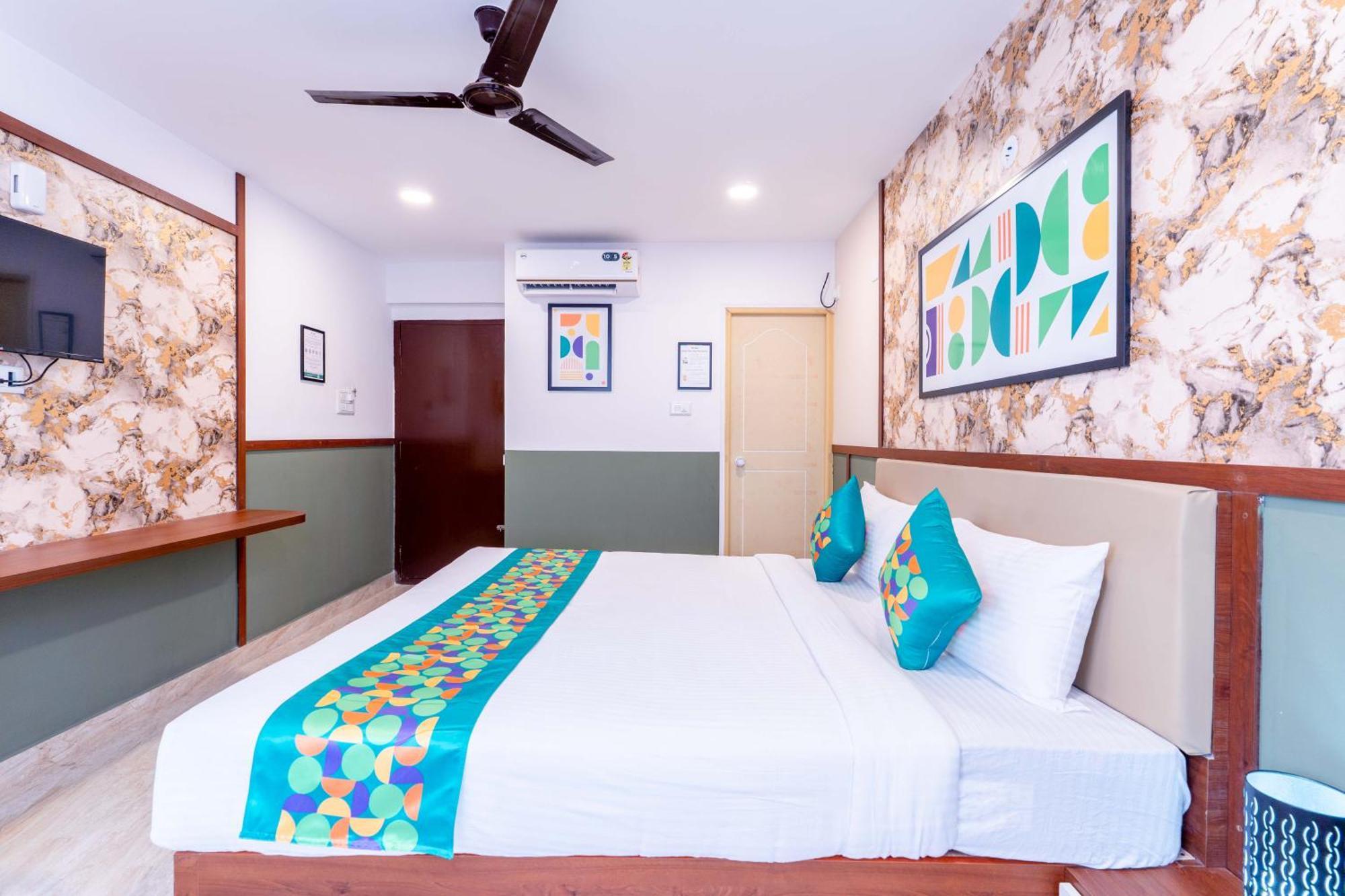 Treebo Emirates Suites Indiranagar Бангалор Экстерьер фото